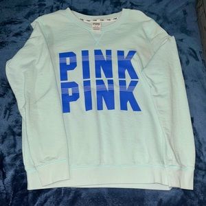 Light Blue, PINK sweater. Size medium.